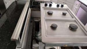 Cooktop removed to access Dacor vent hood in Beaverton