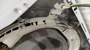 Close-up of burned and worn bearing inside GE dryer in Beaverton OR