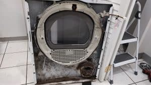 Dirty lint buildup inside GE dryer causing noise issues Beaverton OR