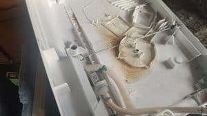 leaking dishwasher valve and mold Bosch inside panel