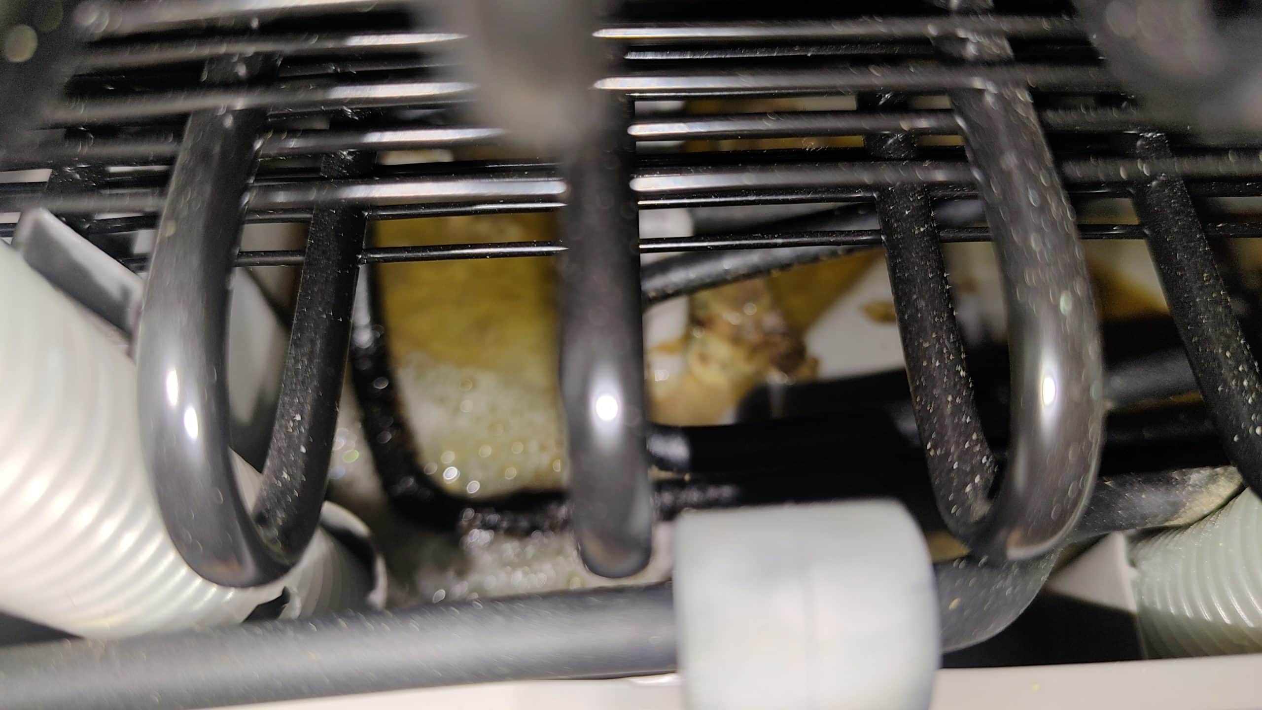 Refrigerant leak location on Frigidaire PRMC2285AF condenser area