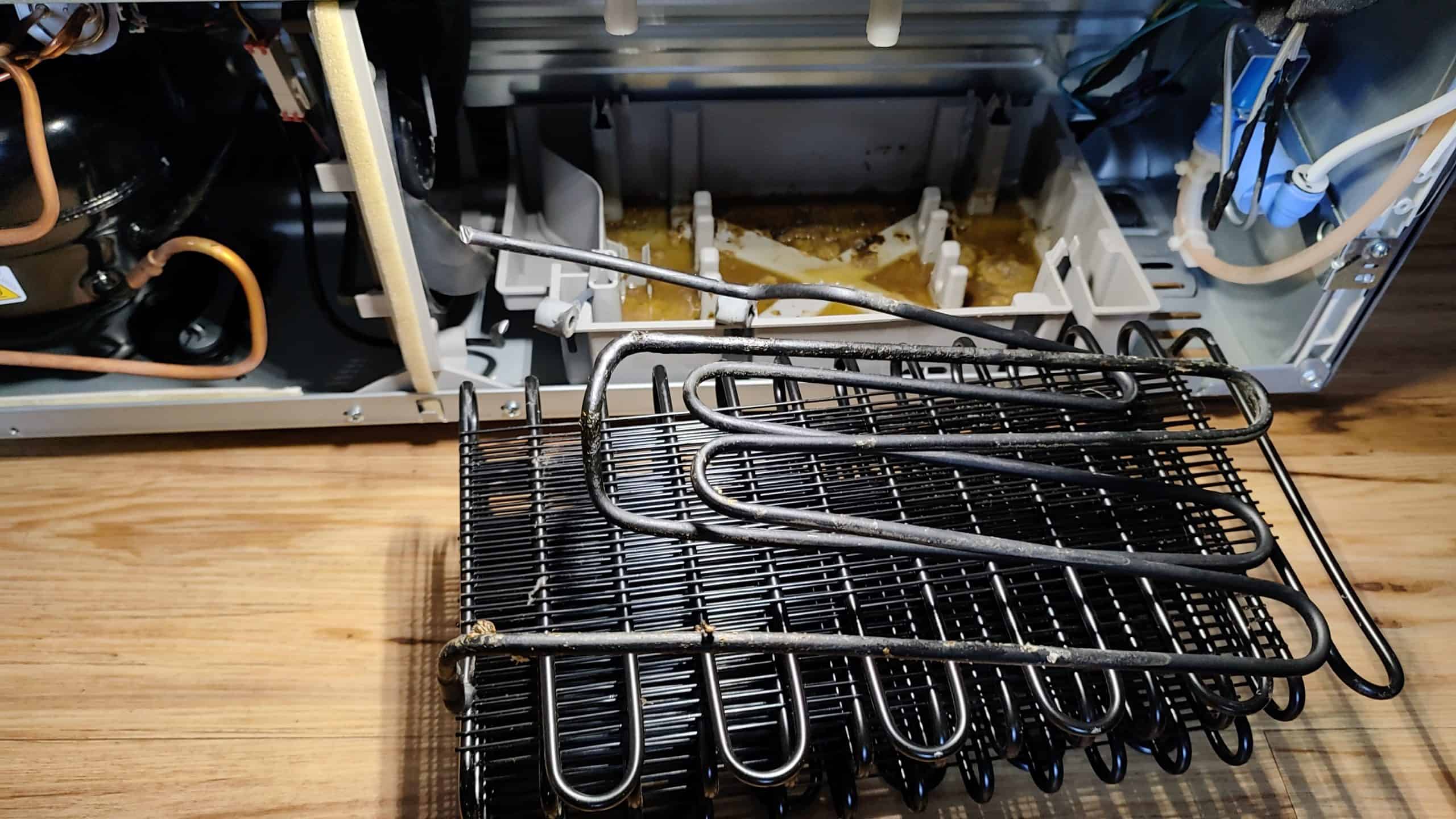 Removed damaged Frigidaire PRMC2285AF condenser coil