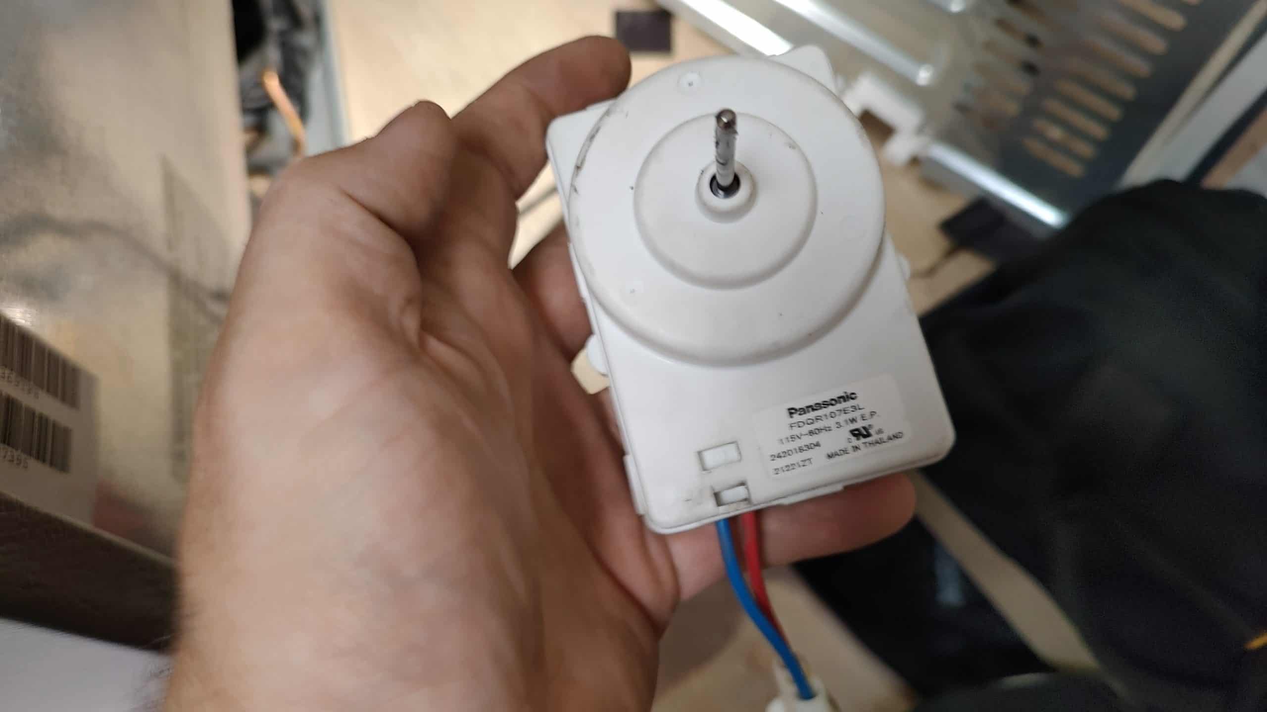 Appliance repair Vancouver - Frigidaire OEM condenser fan motor close-up
