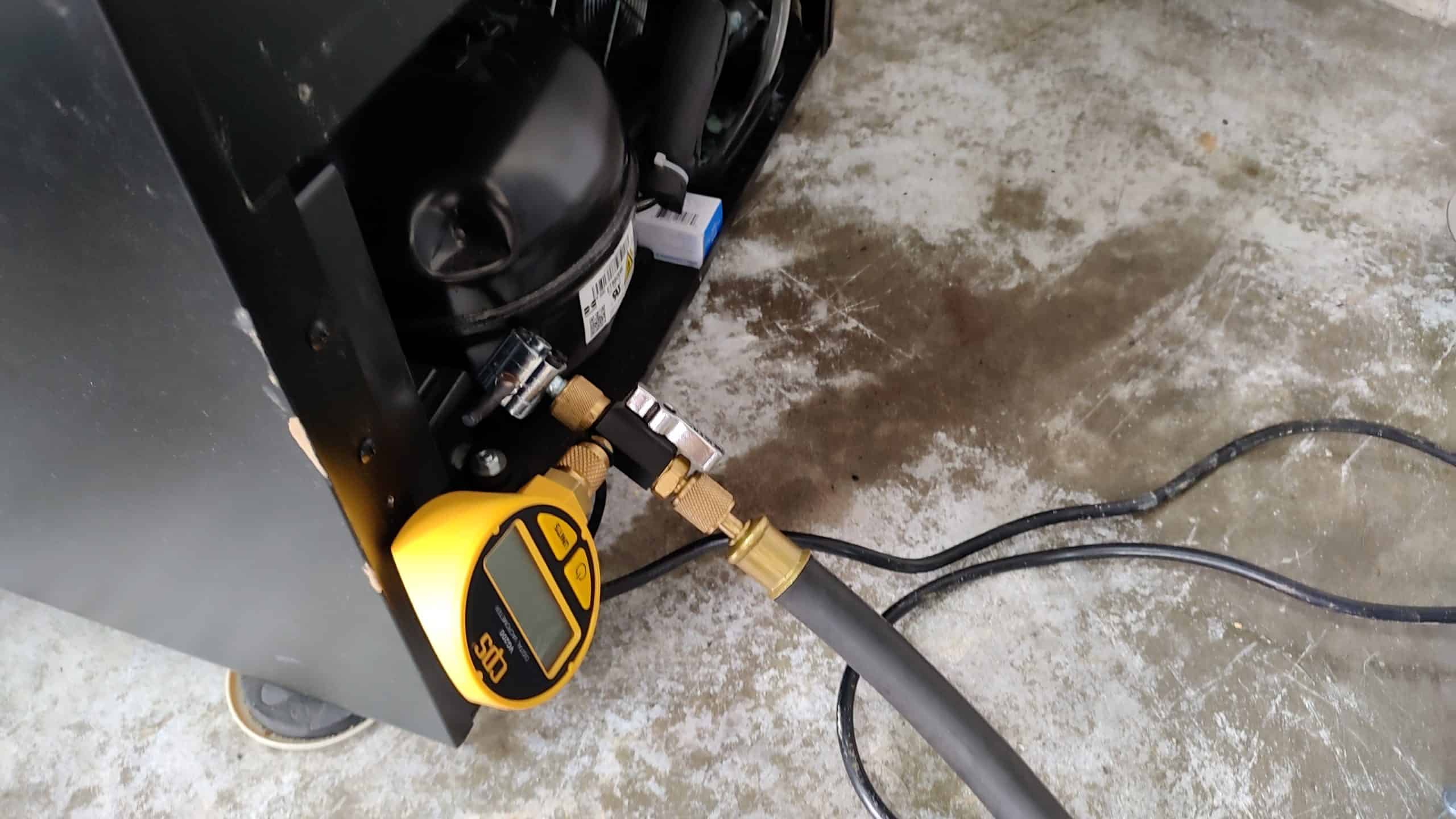 Vacuuming the wine cooler refrigeration system - La Center WA