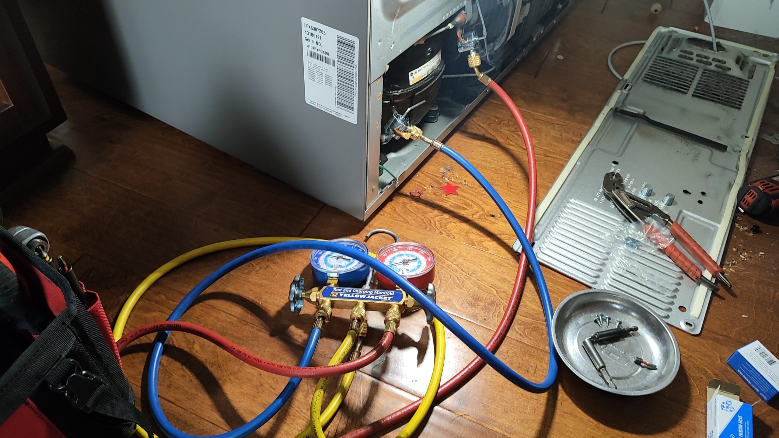 LG refrigerator sealed system lines connected during repair in Portland OR
