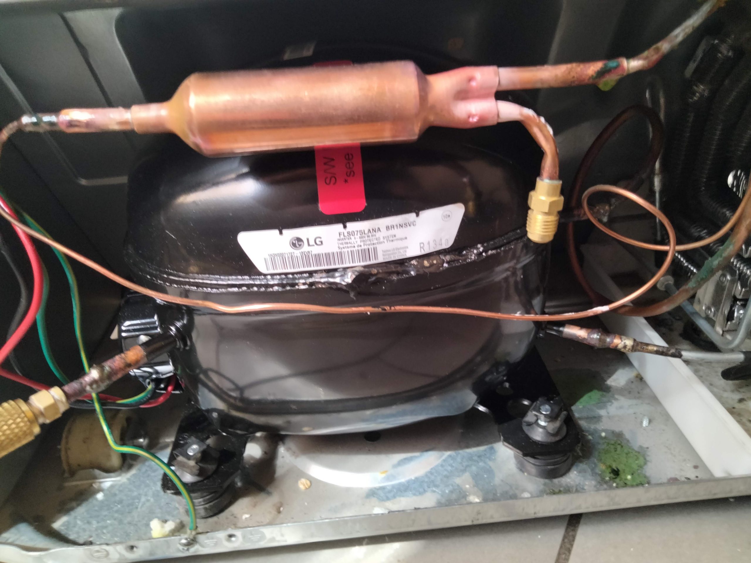New refrigerator compressor installed during sealed system repair in Vancouver WA