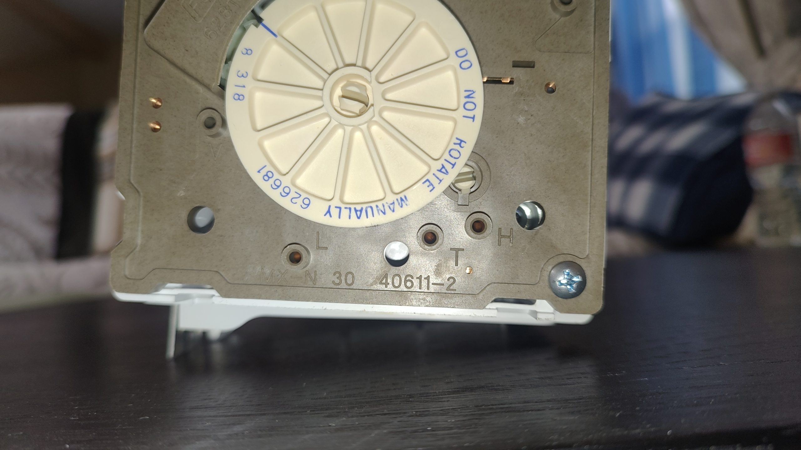 T and H Harvest Test Terminals on a 120V Ice Maker Close-up of the T and H service terminals on a 120V mechanical refrigerator ice maker module.