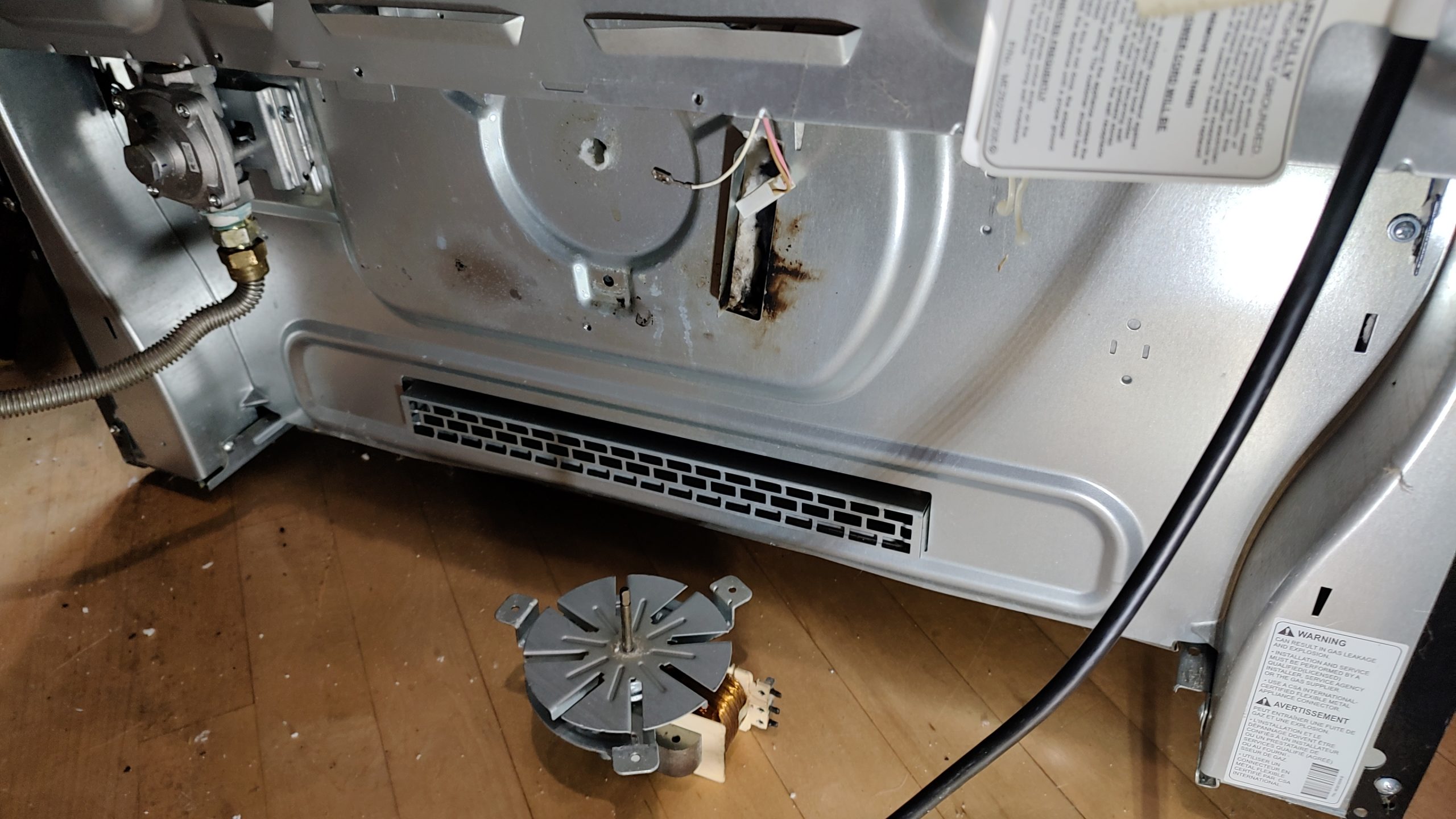 LG gas range convection fan motor removed during oven repair in Camas WA