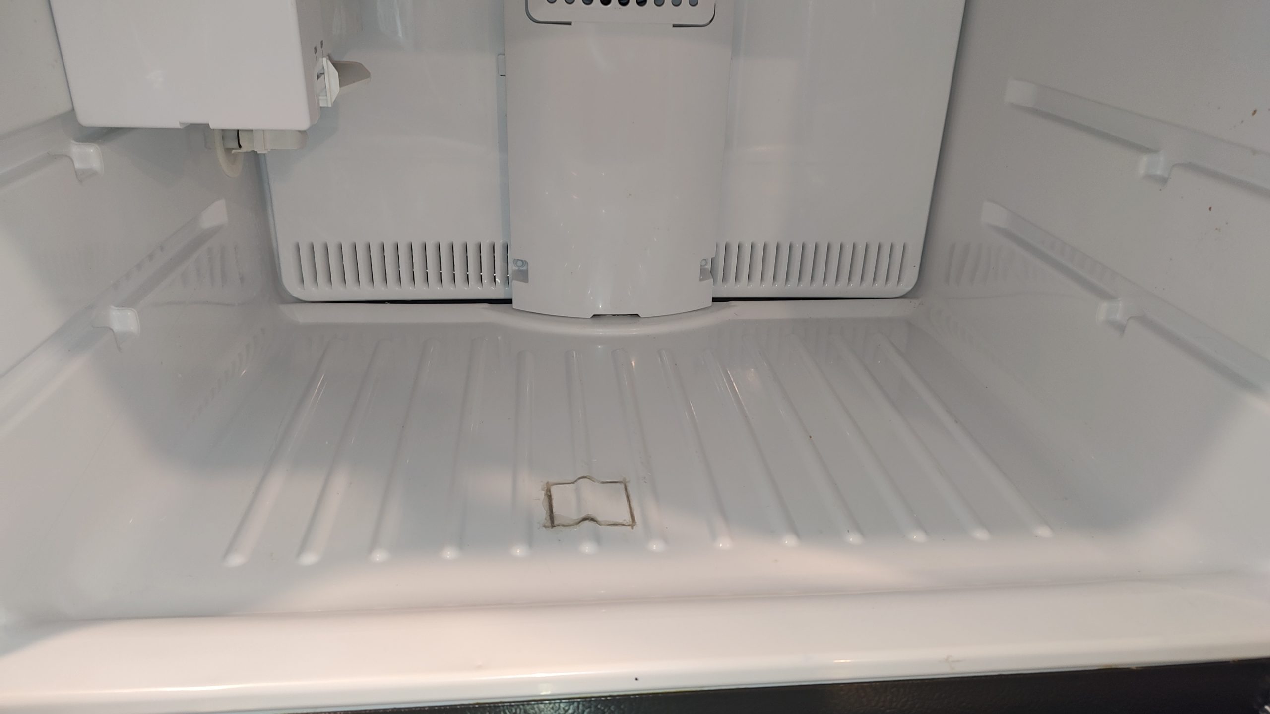 GE Refrigerator Completely Dead — A Power Wire Broke Inside the Cabinet 7 GE refrigerator freezer divider resealed after hidden wire repair